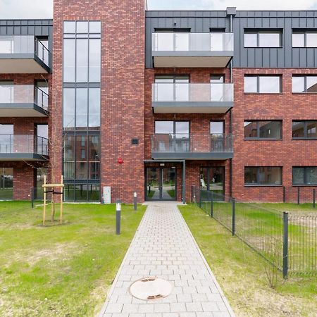 Stara Cegielnia Lake View Apartment By Renters Prestige Poznan Bagian luar foto