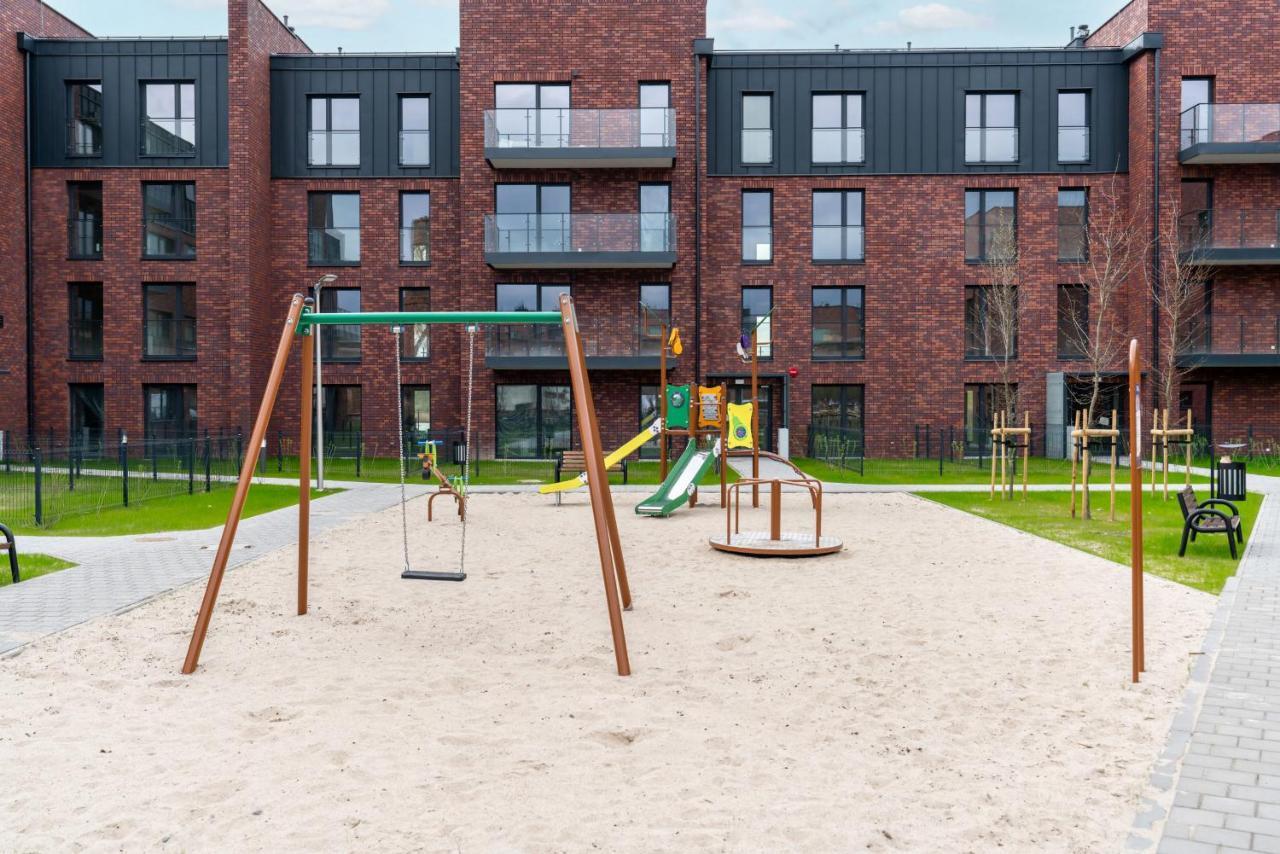 Stara Cegielnia Lake View Apartment By Renters Prestige Poznan Bagian luar foto