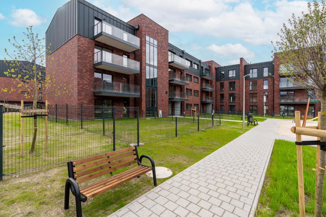 Stara Cegielnia Lake View Apartment By Renters Prestige Poznan Bagian luar foto